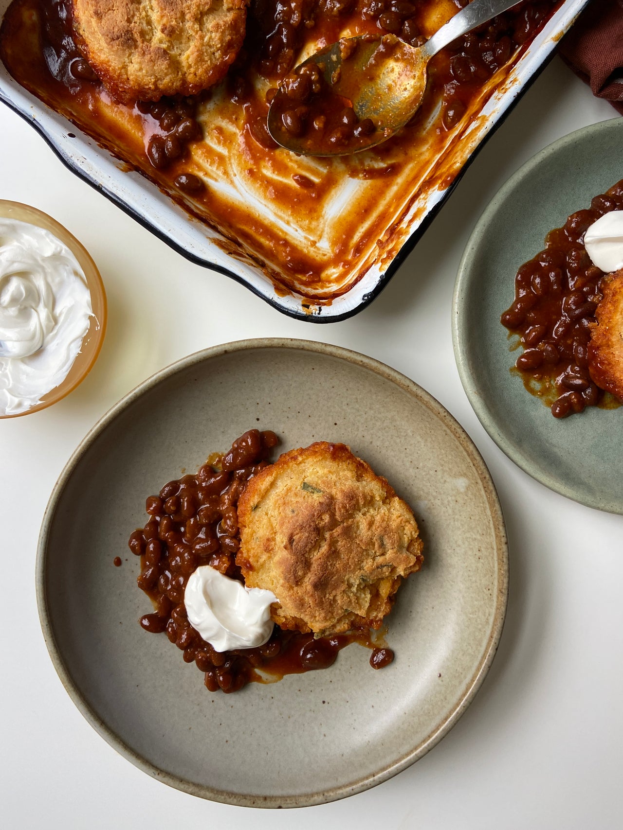 Ali Slagle for Heyday: Apricot Baked Beans with Cornmeal-Sage Biscuits